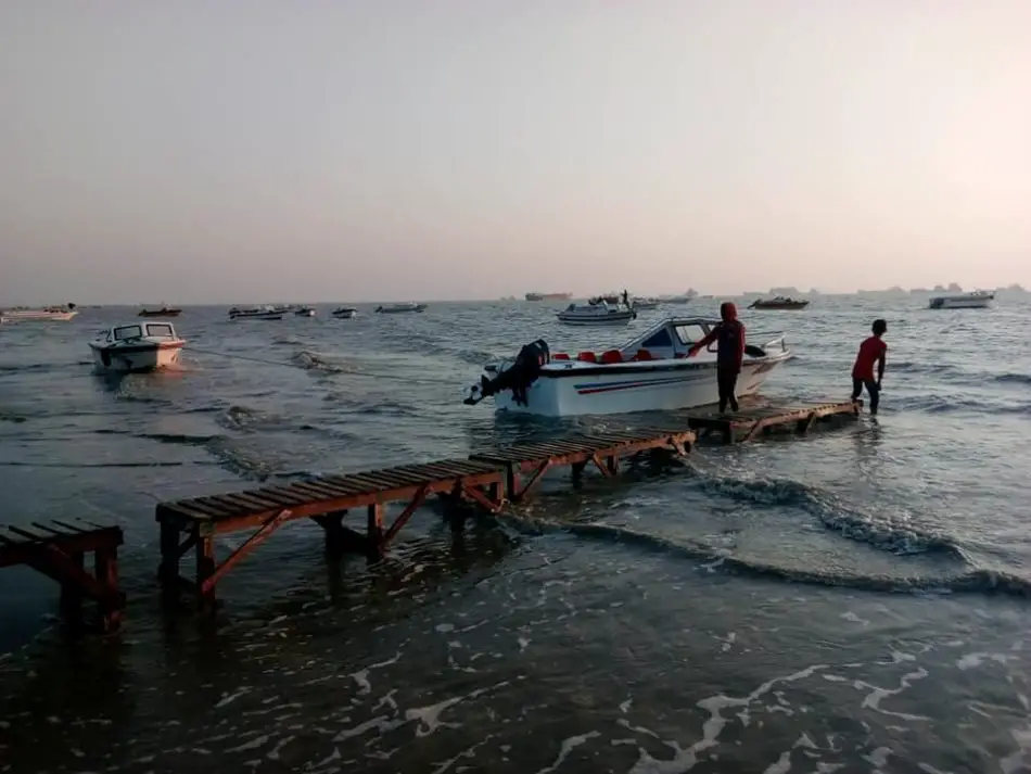 speed boats are in patenga sea. Patenga Sea Beach in Sylhet, Bangladesh